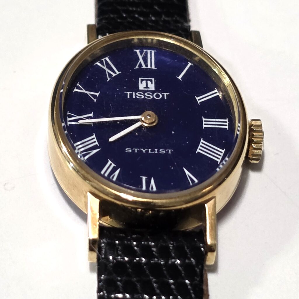 Tissot Stylist in 18 kt Yellow Gold with Blue Dial